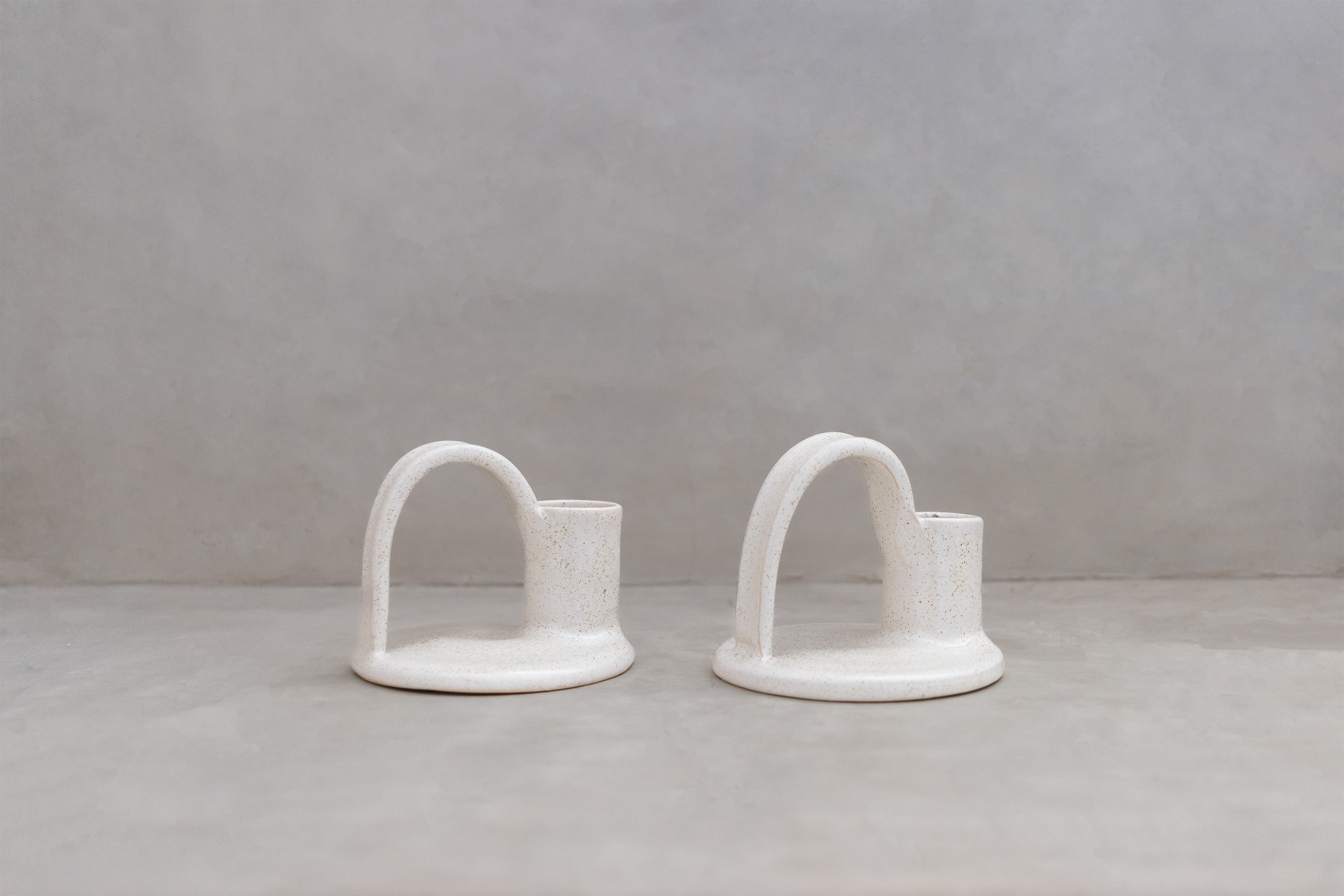 Arch candle holders