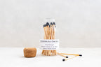 Jar of matches with a label on a white background