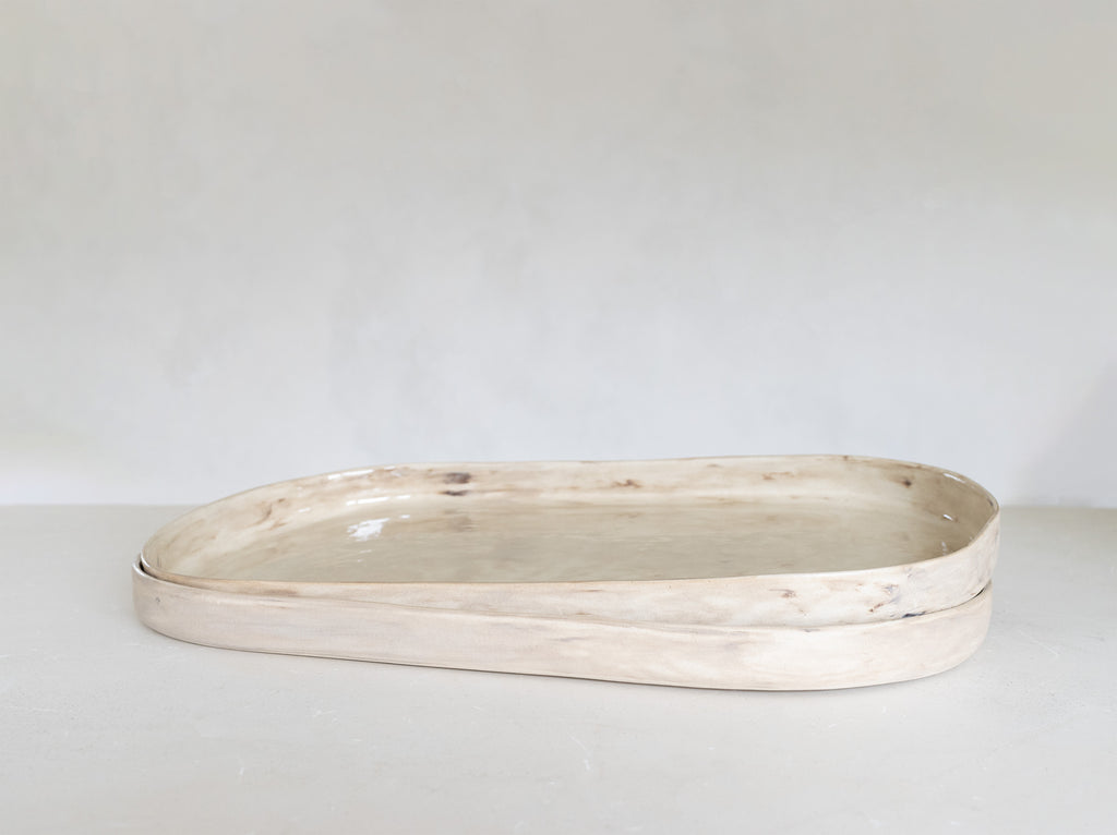 Oval Rectangular ceramic dish on a light gray background