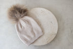 Trend_ING_Baby_beanies_with_pom_poms_cream_colour