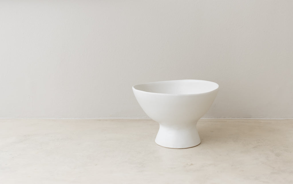 Ceramic clay-footed bowl