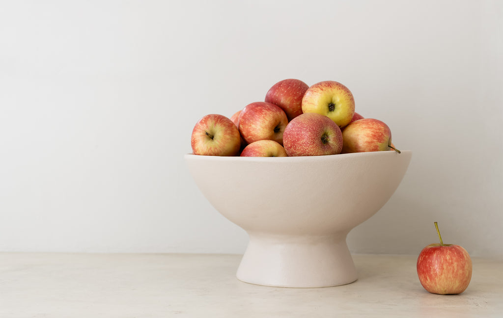 Ceramic clay-footed bowl