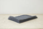 Trend{ING}s Linen Challah/Bread Cover in charcoal; folded on top of each other
