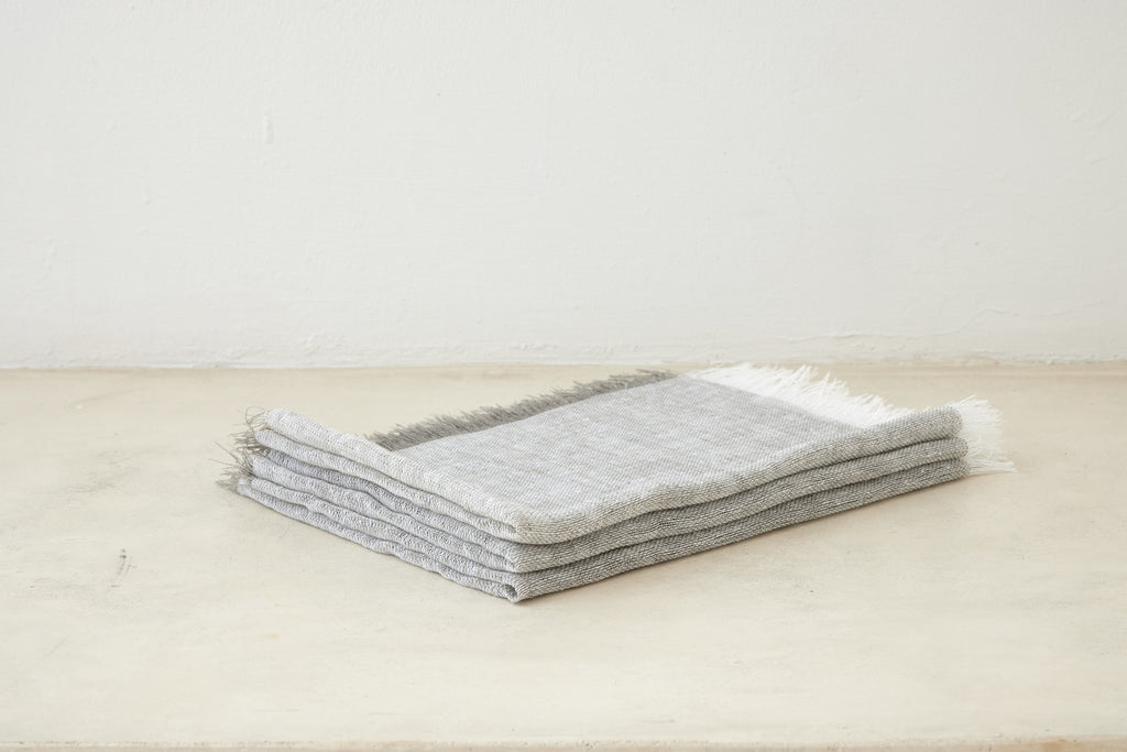Trend{ING}s Linen Challah/Bread Cover in dove grey; folded on top of each other