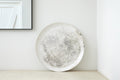 Trend{ING}s elegant XL Acacia flat ceramic platter viewed head on. Head on view of the platter with a speckled white stone finish