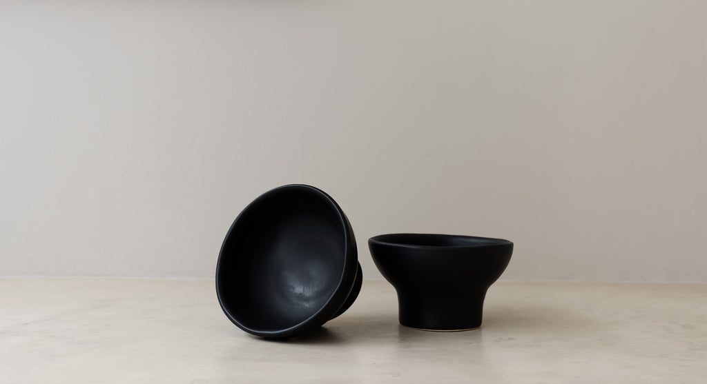 Ceramic clay-footed bowl
