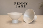 Ceramic clay-footed bowl