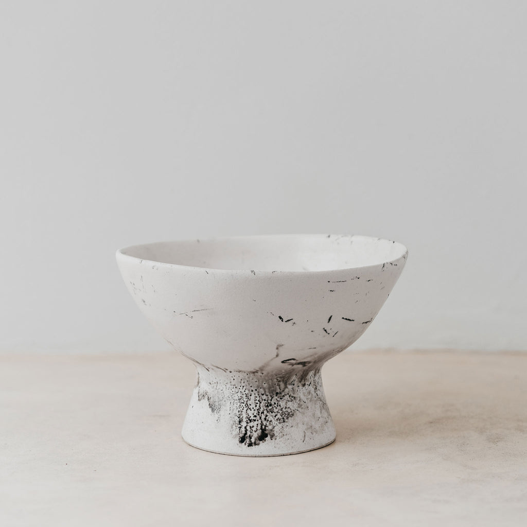 Ceramic clay-footed bowl
