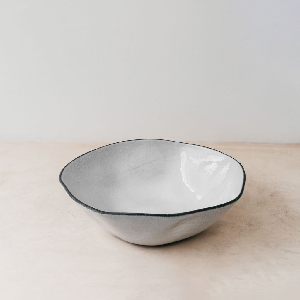 Trend{ING}s Drunken Stone Salad Bowl in Basalt finish; Viewed from the top; empty bowl
