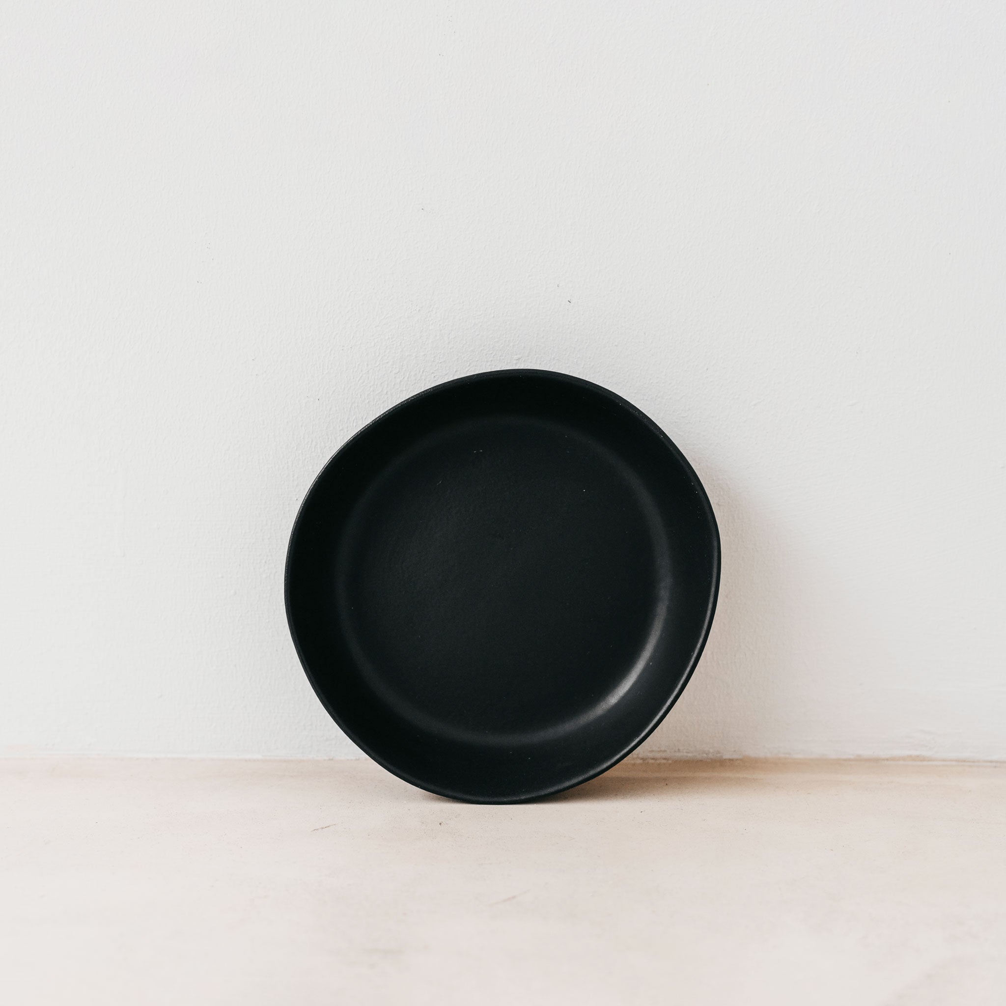 Trend{ING}s Wren Stone Breakfast Bowl in Coal Black; viewed head on